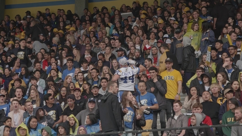 Thumbnail for Drummer rallying the students in Homecoming Event