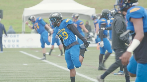 Thumbnail for Medium Shot of Football Players warming up on the field