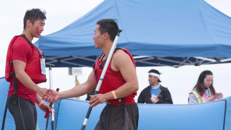 Thumbnail for Longboat rower greets his team after race