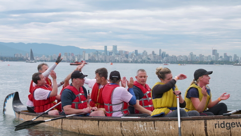 Thumbnail for Longboat team docked at shore and cheering 