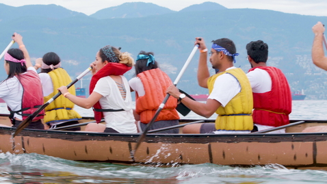 Thumbnail for Panning Shot of Longboat Rowers vigorously rowing
