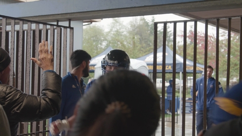 Thumbnail for Football Players greet Fans before entering locker room, medium shot